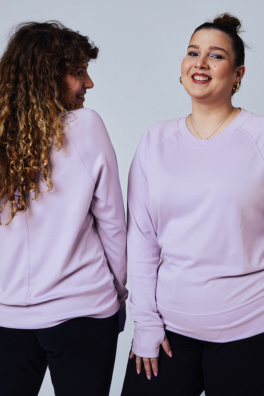 Woman wearing loungewear crewneck sweatshirt made from sustainable TENCEL and organic cotton in Digital Lavender - 1