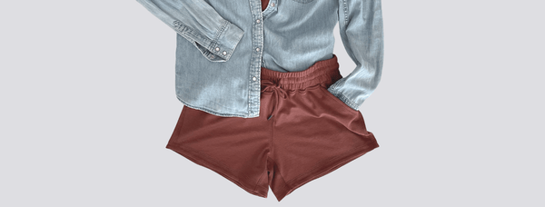 comfy tencel organic cotton shorts with a jean shirt on a flat background. 