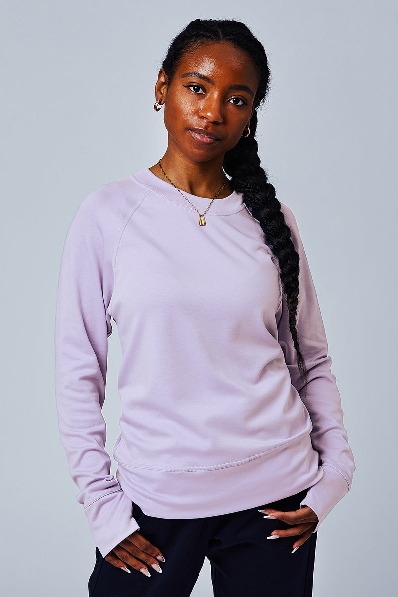 Woman wearing loungewear crewneck sweatshirt made from sustainable TENCEL and organic cotton in Digital Lavender - 5